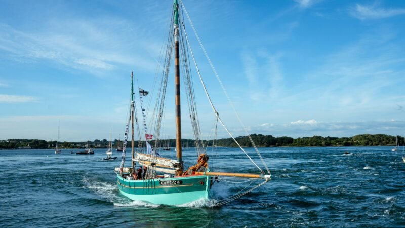 Angler achieving fishing mastery using Piscifun gear at sunrise by the lake